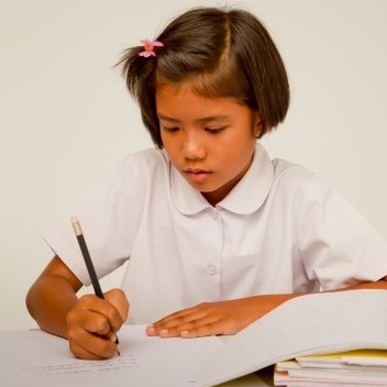 Girl writing homework